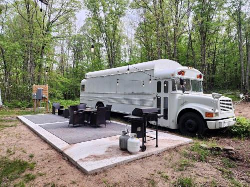 Bitely Maison | Rustic Converted School Bus with Outdoor Shower Near ORV Trails in Manistee National Forest, Michigan