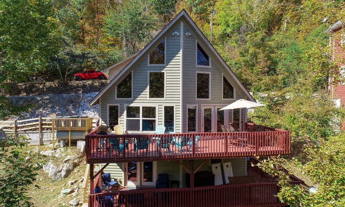 Speedwell Cabine | Rustic Lakefront Cabin with private double-deck dock, slide, hot tub, more!
