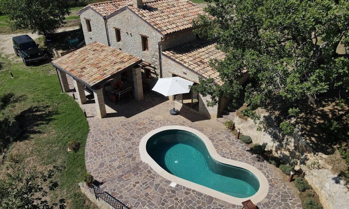 Civitella Casanova Maison | Maison en pierre rustique avec une touche moderne