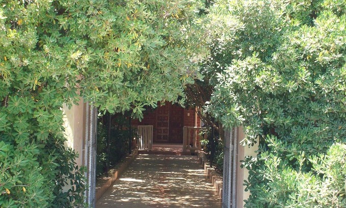 Piscinas Lit Et Petit-Déjeuner | Sa Domu Sarda - Appartement salle de jeux dans une villa mitoyenne avec entrée indépendante