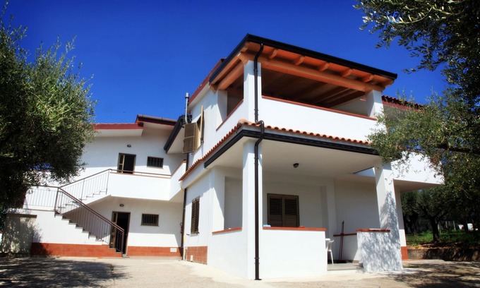 Santa Maria Appartement | Vacances à domicile Sangeni - Appartement n.1, au rez-de-chaussée avec veranda