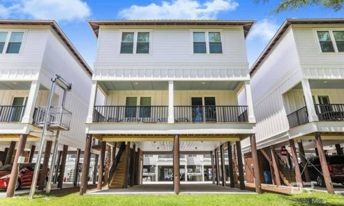 Orange Beach Maison | Seaside Swagger- beautiful coastal waterfront with boat slip!