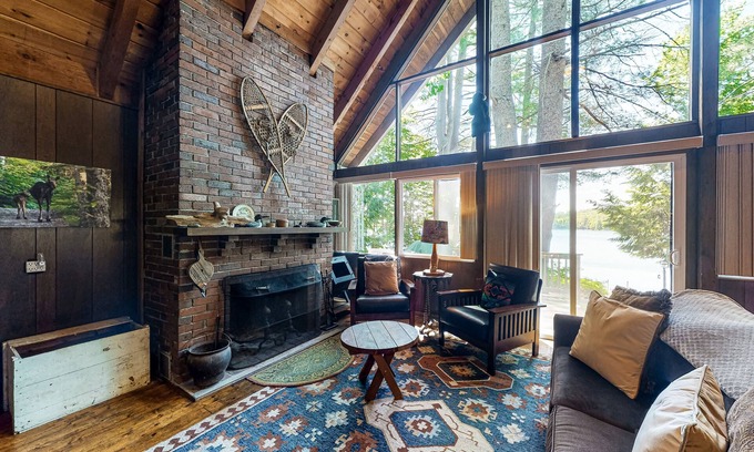 Parsonsfield Maison | Secluded waterfront cabin with private dock, kayak, canoe, gas grill & deck