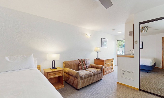 West End Cabine | Second-floor room on Main St - pool & hot tub - walk to lifts, dog-friendly