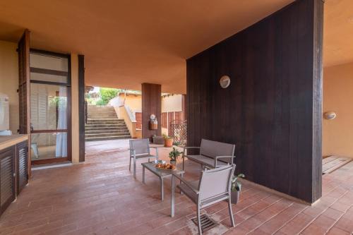 Portisco Appartement | Secret Garden House - Happy Rentals