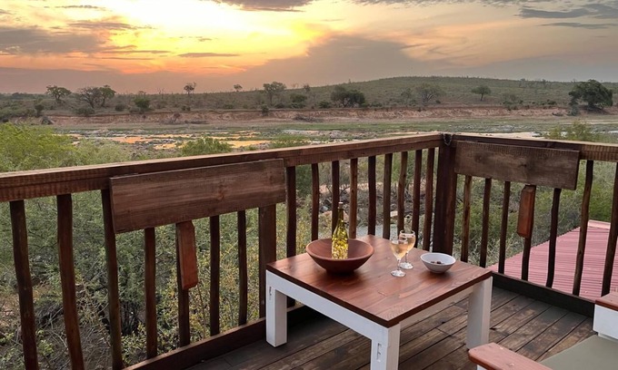 Marloth Park Cabine | See the Big 5 from the viewing deck of this incredible riverside bush lodge!