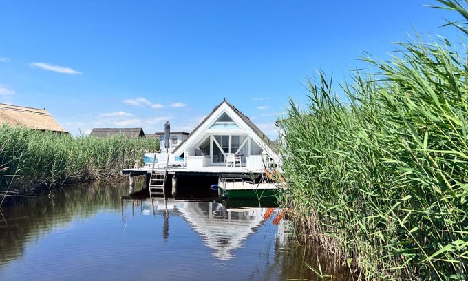 Rust Chalet De Ski | Seehütte Neusiedlersee - Strandhaus, Elektroboot inklusive