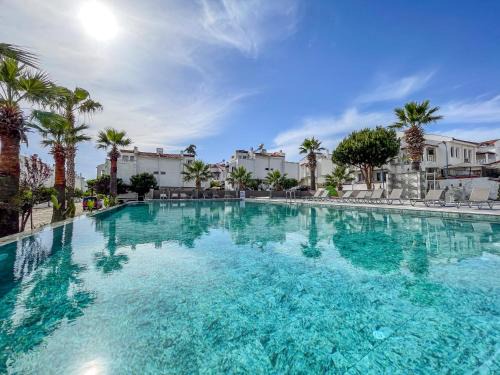 Kadnlar Denizi Mahallesi Maison | Semi Detached Villa in Complex with Shared Semi Olympic Swimming Pool in Kusadasi