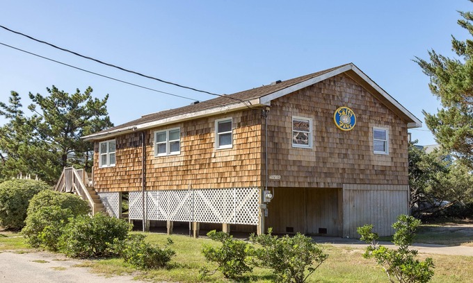 Ocean Isle Estates Maison | Semi-oceanfront dog-friendly home with private hot tub, decks & shared pool