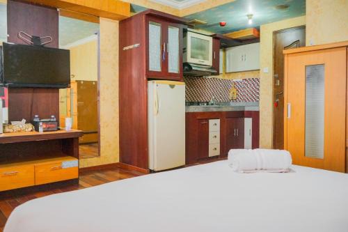 Panunggangan Utara Appartement | Simple and Minimalist Studio Apartment at Great Western Resort By Travelio