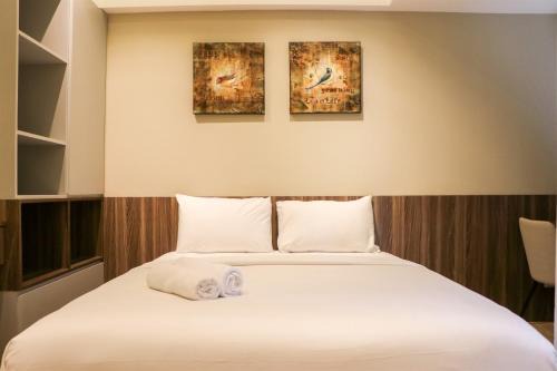 Duren Sawit Appartement | Simply Look Studio Room Gateway Park LRT City Jatibening Apartment By Travelio