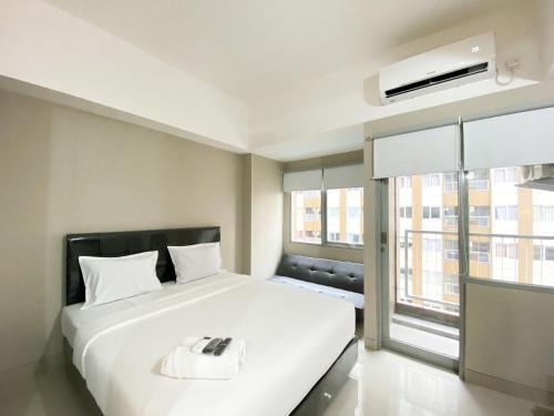 Duren Sawit Appartement | Simply Studio Room Gateway Park LRT City Jatibening Apartment By Travelio