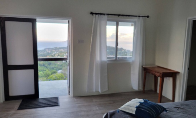 Colonarie Appartement | Welcome to the SkyView Suite at WindBlow Villa!