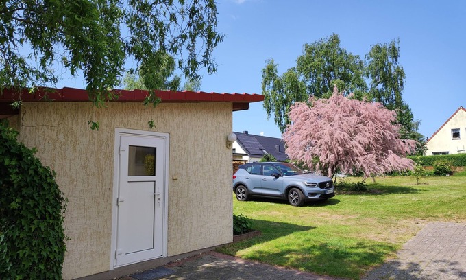 Hagebok Maison | Small bungalow for two people with a sunny terrace. Near the Baltic Sea.