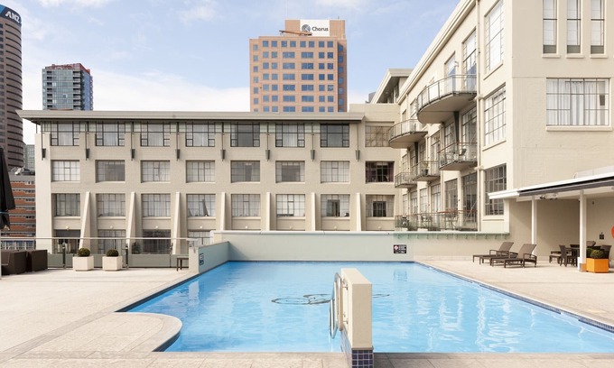 Auckland Central Business District Appartement | Snazzy Downtown Studio by Sky Tower avec piscine sur le toit
