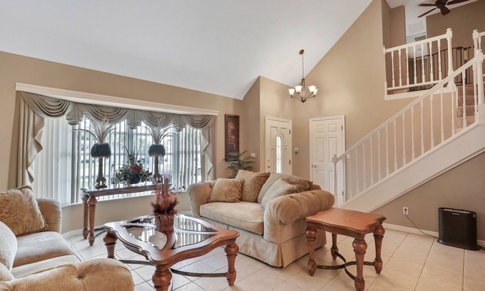 Harbor Hills Maison | Snowbird-friendly elegant home with waterfront location, pool, grill, fireplace