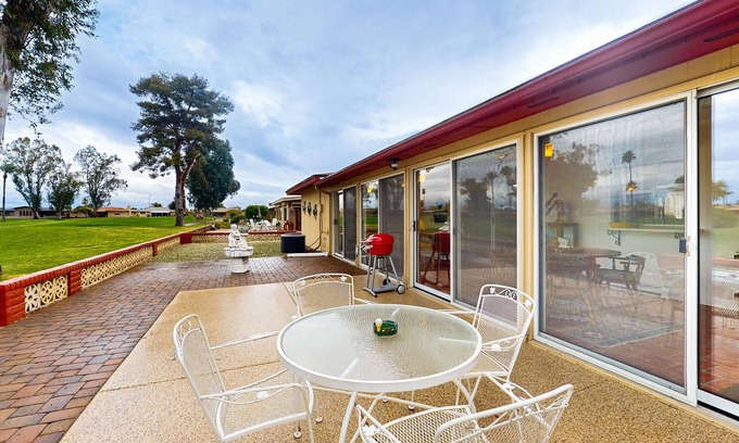Sunland Village Maison | Snowbird-friendly golf-front home with pool, hot tub, grill, smart TVs, W/D, AC