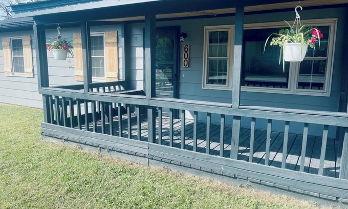 Ava Maison | Snuggle up and relax with the whole family at this Ava home.