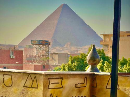 Giza Hôtel | SOFT pyramids view