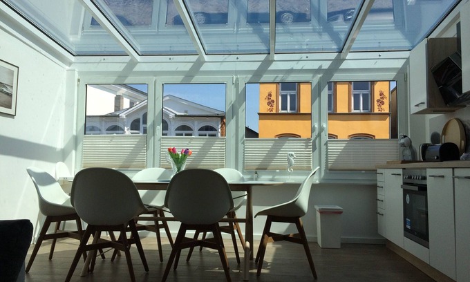Warnemuende Appartement | « Voile solaire » Inside out: central comme il se - avec jardin d'hiver