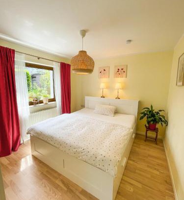 Niederzwehren Appartement | Souterrainwohnung mit großem Garten und Sauna