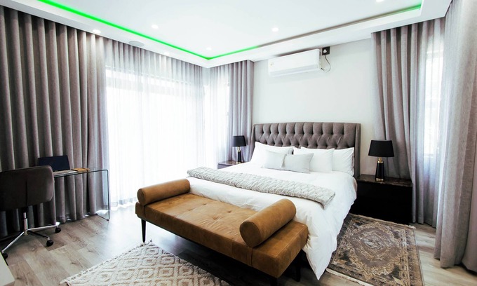 Harare Villa | Spacious 4-bedroom villa with WiFi and AC in fantastic Harare
