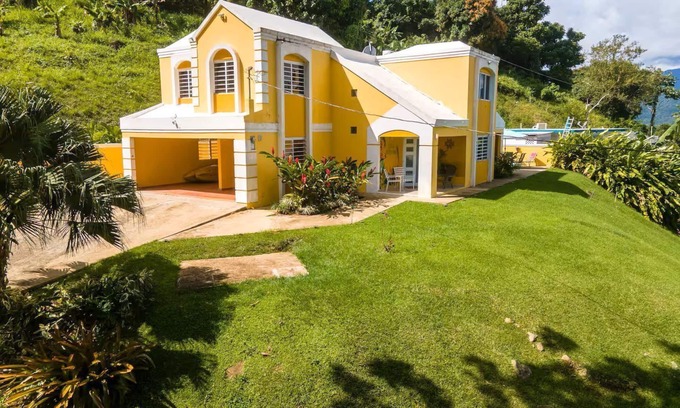 Rio Maison | Spacious 5-bedroom house views of El Yunque and saltwater spa.
