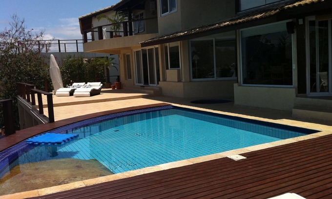 Sao Pedro Maison | Maison spacieuse et confortable à Ilhabela avec une vue imprenable w / la mer