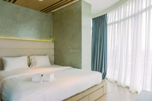 Cikokol Appartement | Spacious and Homey 2BR at Tree Park City Cikokol Apartment By Travelio