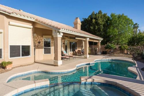 Palm Valley Maison | Spacious golf course house with pool heater, spa