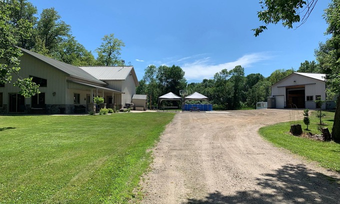 Spicer Maison | Spacious home with additional camper hook ups on 10 private acres.