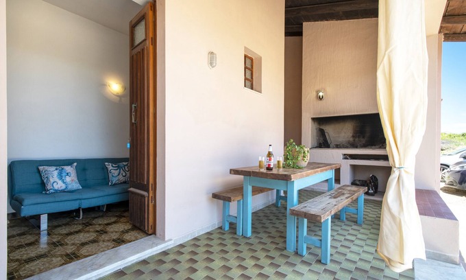 Paduledda Maison | Maison spacieuse à Costa Rossa avec vue partielle sur la mer et terrasse