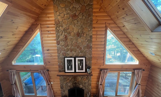 East Wakefield Maison | Spacious Lakefront Log Home for Family Fun & Relaxation- deck, firepit, gameroom