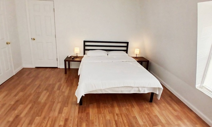 New London Maison | Spacious master bedroom with a queen and full bed, 2 blocks from Route 95