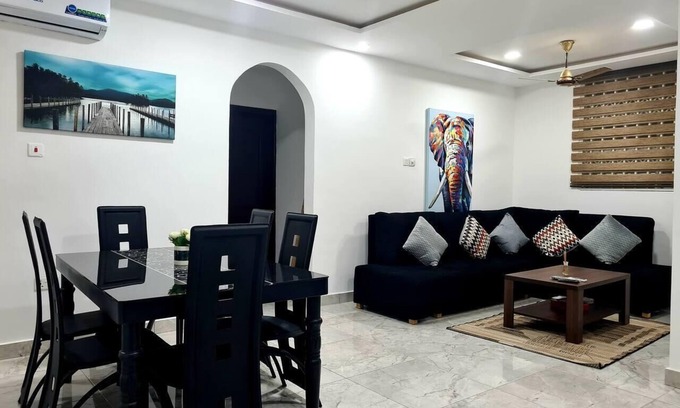 Adenta Appartement | Spacious, Quiet & Cozy- Close to Highway-Parking