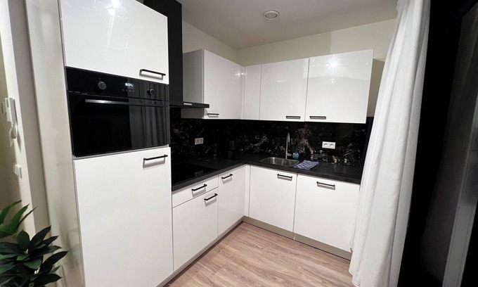 Goirle Appartement | Spacious stay with parking, WiFi, and garden views. Close to nature reserves and shops. Sleeps four.