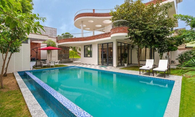 Jaipur Villa | StayVista's The Tree House - City-Center Villa with Outdoor Pool, Spacious Balconies & Vast Lawn