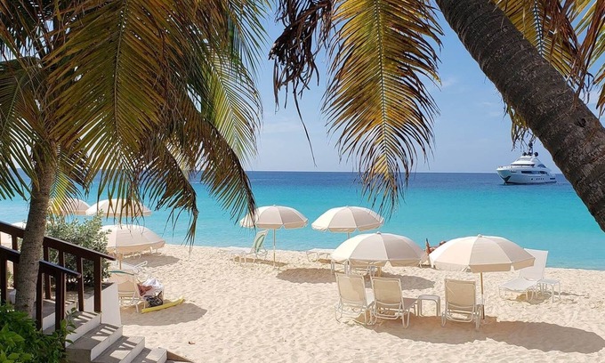 West End Village Hôtel | Steps Away from the Beach! Enjoy Scenic Sunset Right on Your Own Private Patio