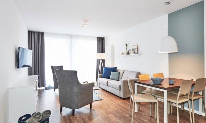 Bensersiel Appartement | Strandnahes, Modernes Apartment mit Westbalkon Inkl. Schwimmbad- & Saunanutzung