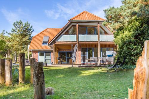 Neuhaus Maison | Strandhaus Hühnergott