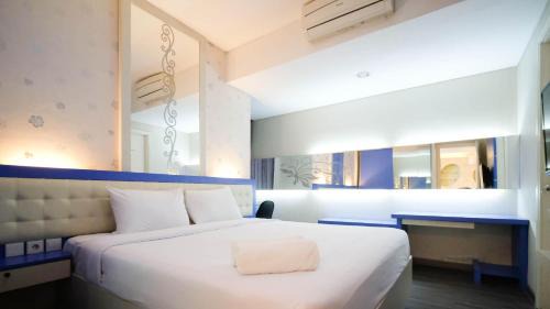 Surabaya Appartement | Strategic and Comfy 2BR Apartment at Trillium Residence By Travelio