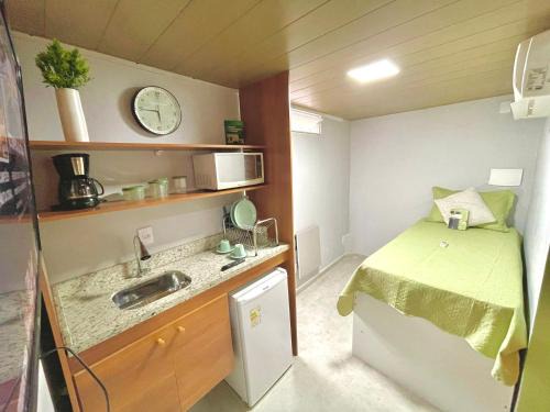 Macae Maison | STUDIO aconchego, com Ar, Wifi, Smartv e Cozinha