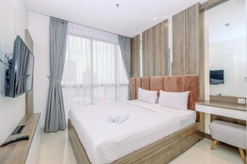 Semanggi Appartement | Stunning and Cozy 1BR Apartment at Ciputra World 2 By Travelio