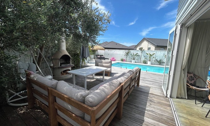 Papamoa Beach Maison | Stunning Family Home with Pool, Spa & Walk to Beach in Papamoa
