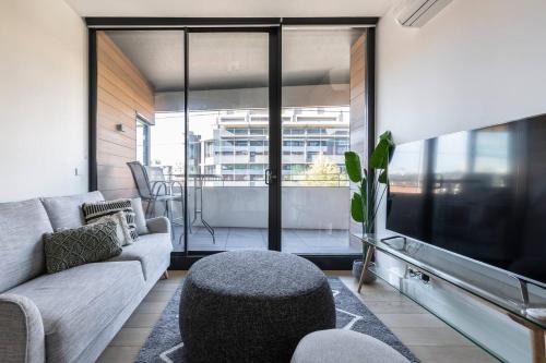 Richmond North Appartement | Stunning Modern Style with a Gym, Pool and Spa