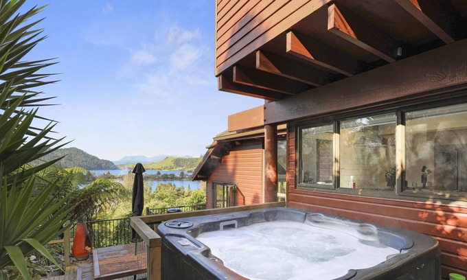 Lake Okareka Maison | Stunning Secluded Lake Views - 4 Bedrooms, 2 Bathrooms with Spa and Lake Views