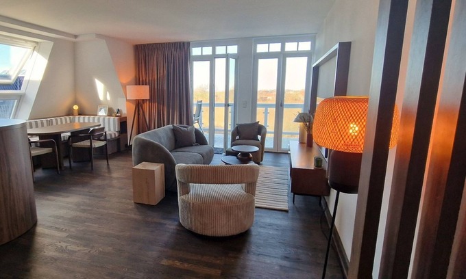 Wremen Appartement | Stylish and spacious penthouse vacation apartment with sauna and North Sea view - Resort Deichgraf