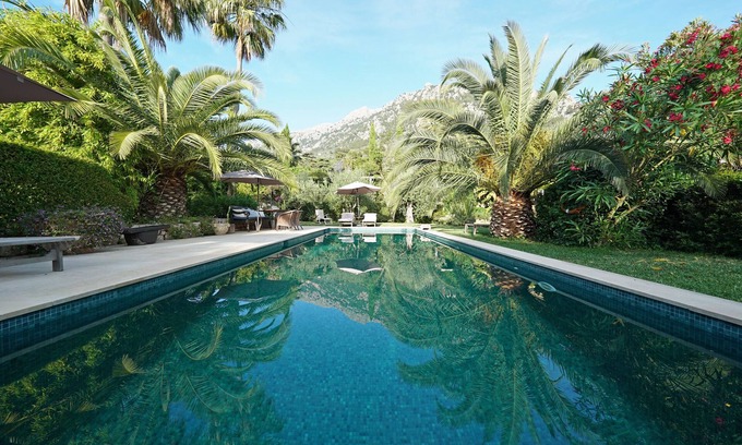 Biniaraix Maison | manoir élégant dans un cadre enchanteur jardin à Biniaraix pour 10 personnes