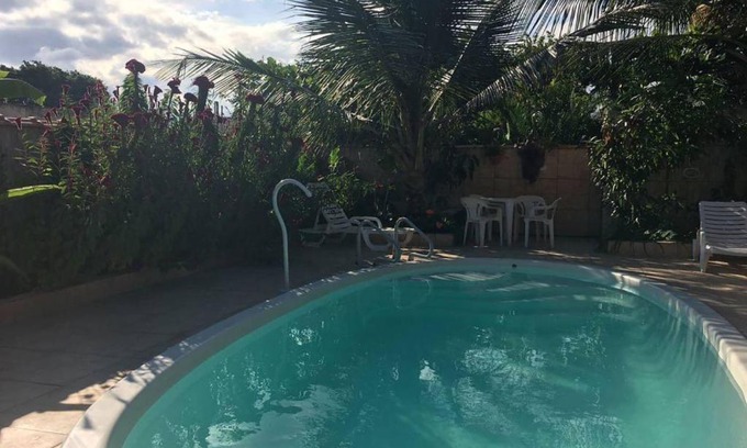 Bairro da Enseada Maison | Suíte 4 para PcD com piscina em Caraguatatuba