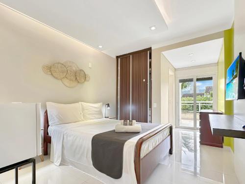Enseada Appartement | Suíte Piscina e Churrasqueira AC Acesso a Praia